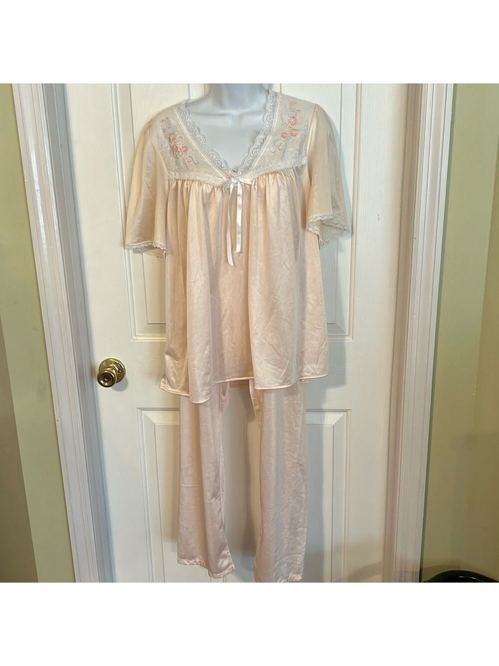 Feather bed nylon pajama set.Size Medium.Top and bottom.Preowned. Good condition
